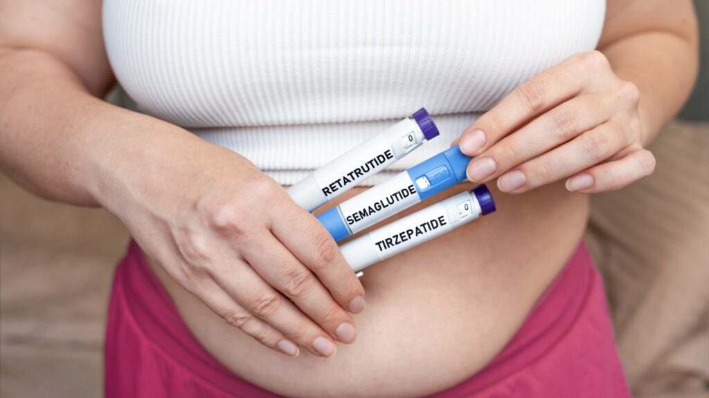 Woman holds different GLP-1 weight loss injections