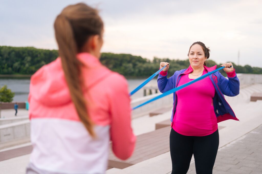 Woman does resistance training to maintain weight loss after GLP-1s